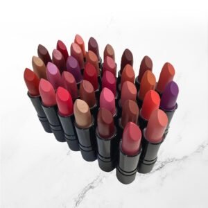 Photo showcasing Radical Cosmetics' best-selling lipstick shades, displayed in a gradient from light to dark. The first shade is a soft nude pink, perfect for a natural, everyday look. The second shade is a rich rose, offering a beautiful balance between warm and cool tones for a versatile pop of color. The third shade is a bold berry, ideal for making a statement with its deep, vibrant hue. The final shade is a dark, classic red, giving a timeless, glamorous finish. Each lipstick features a creamy texture with long-lasting wear and full coverage. Keywords: best-selling lipstick, clean beauty lipstick, long-lasting lip color, vegan lipstick, cruelty-free cosmetics, non-toxic lip products, custom lipstick shades, inclusive makeup, bold lip shades, luxury lipstick, Radical Cosmetics lip products, private label lipstick.