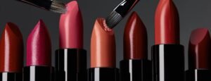 Photo showcasing Radical Cosmetics' best-selling lipstick shades, displayed in a gradient from light to dark. The first shade is a soft nude pink, perfect for a natural, everyday look. The second shade is a rich rose, offering a beautiful balance between warm and cool tones for a versatile pop of color. The third shade is a bold berry, ideal for making a statement with its deep, vibrant hue. The final shade is a dark, classic red, giving a timeless, glamorous finish. Each lipstick features a creamy texture with long-lasting wear and full coverage. Keywords: best-selling lipstick, clean beauty lipstick, long-lasting lip color, vegan lipstick, cruelty-free cosmetics, non-toxic lip products, custom lipstick shades, inclusive makeup, bold lip shades, luxury lipstick, Radical Cosmetics lip products, private label lipstick.