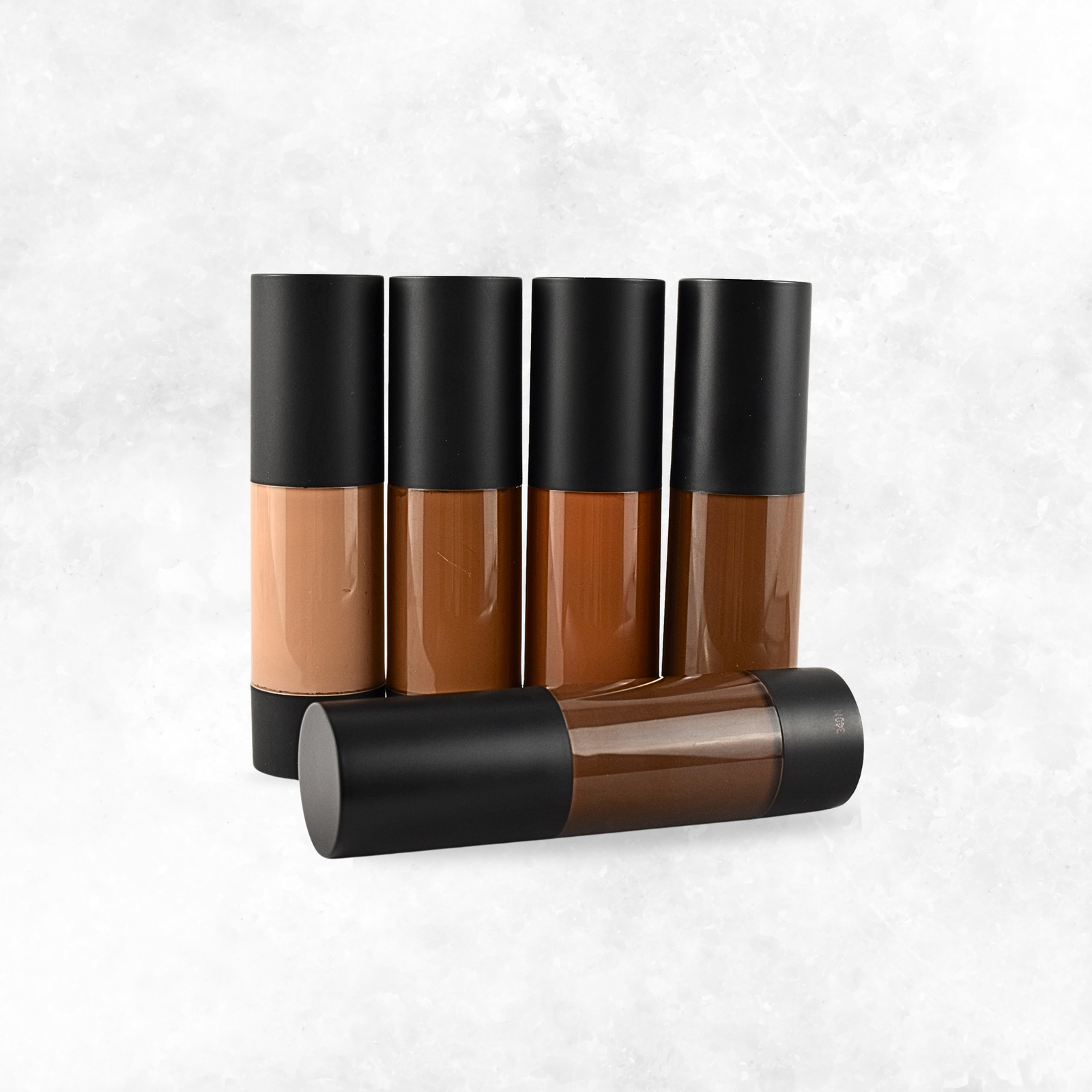 Complete Deep Foundation Kit by Radical Cosmetics – five pressed powder, liquid foundation, concealer, and tinted moisturizer samples in dark shades for deep skin tones. Clean, cruelty-free, talc-free, and made in the USA