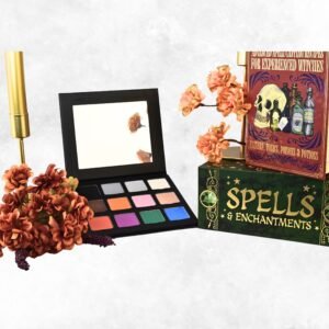 Witching Hour Eyeshadow Palette with 12 bright, high-pigment shades in red, green, black, and shimmer tones, cruelty-free and made in the USA for versatile eye makeup looks.