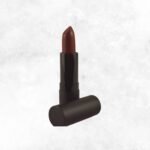 Close-up of Scarlet Affair lipstick in a sleek tube, showcasing its rich, bold red shade with a smooth, creamy finish.