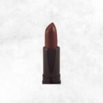Close-up of Scarlet Affair lipstick in a sleek tube, showcasing its rich, bold red shade with a smooth, creamy finish.