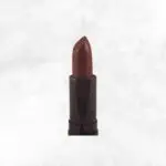 Close-up of Scarlet Affair lipstick in a sleek tube, showcasing its rich, bold red shade with a smooth, creamy finish.