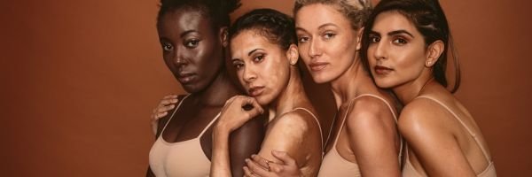 Women of multiple races showcasing their diverse skin tones and textures.